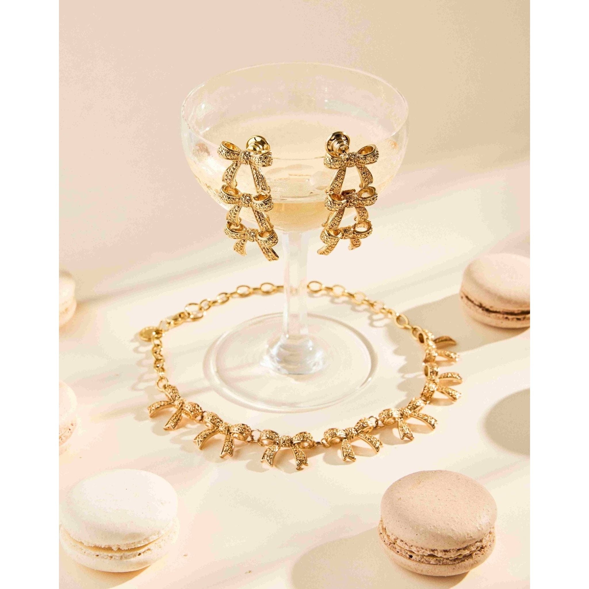 RB TRIPLE BOW EARRINGS